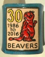 BLUE BEAVER 30 EMBOSSED WOGGLE WITH RED BEAVER & YELLOW 30